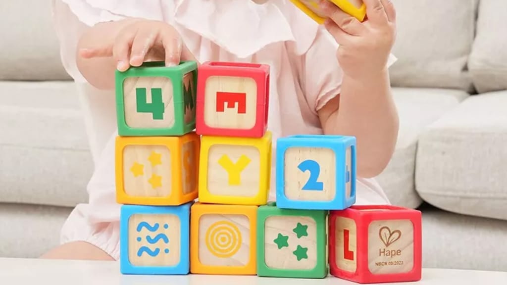 Hape Agarra y apila bloques de construcción de silicona y madera
