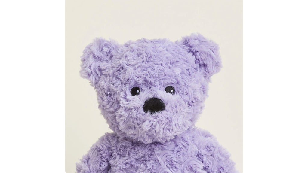 Warmies oso rizado morado
