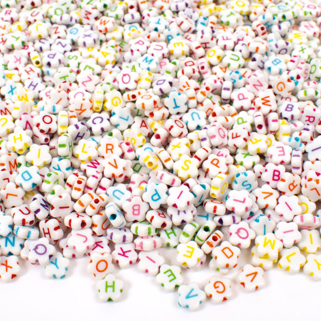 imagen de PlayBox: Conjunto de cuentas con forma de flor blanca y letras 920 unidades 1