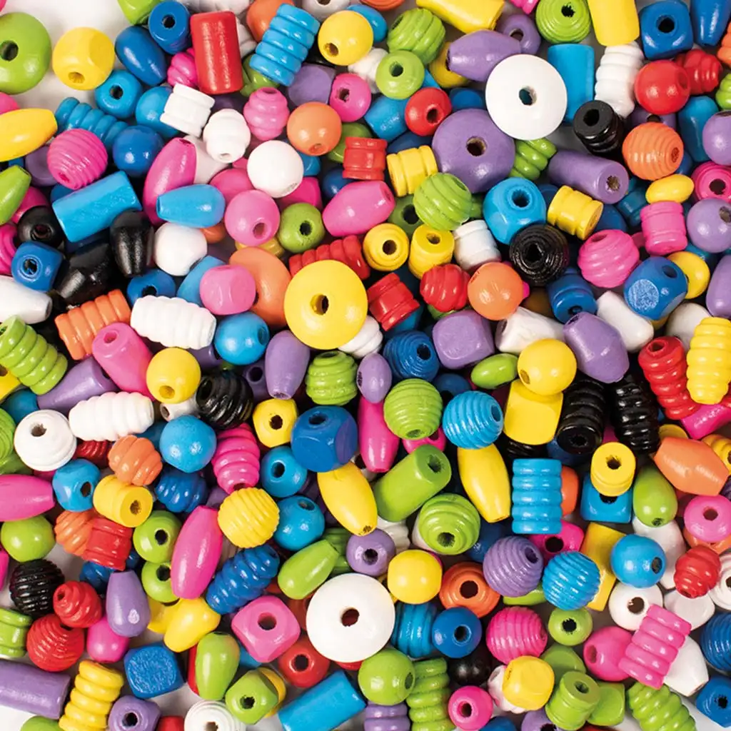 imagen de PlayBox: Paquete de 250g de cuentas de madera en colores básicos 1