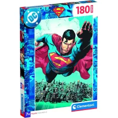Puzzle de 180 piezas de DC Comics Superman volando sobre la ciudad - Clementoni