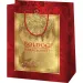 Bolsa de regalo exclusiva mediana con la inscripción Feliz Navidad en color dorado-rojo 18x10x23cm