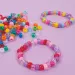 imagen de PlayBox: Conjunto de perlas transparentes y de colores de 1200 piezas 2